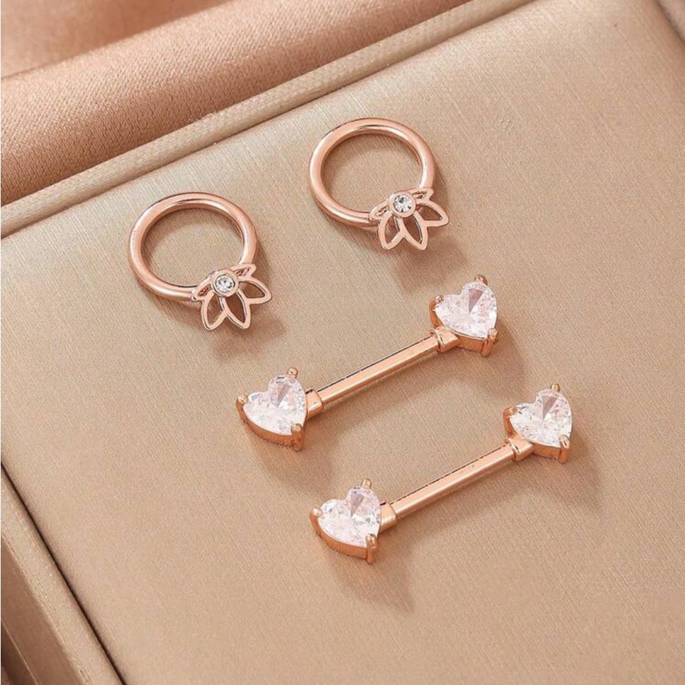 Heart nipple rings and lotus flower hoops
